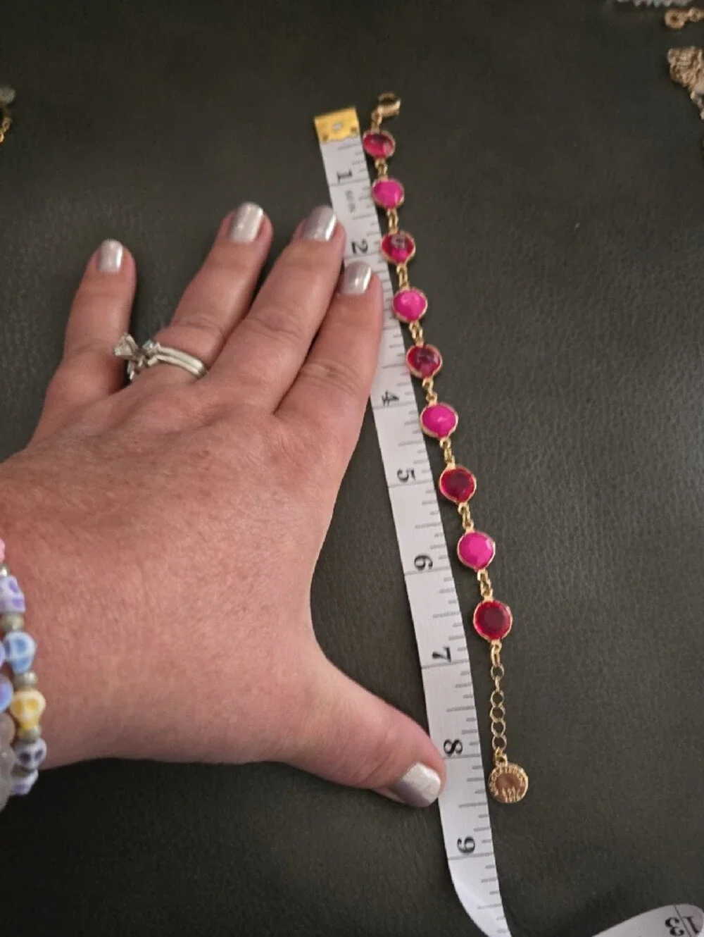 Liz Claiborne Gold Bracelet with Fuchsia Gemstones